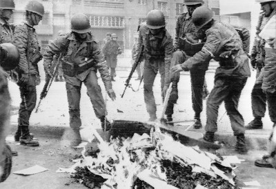 Putschists burning something